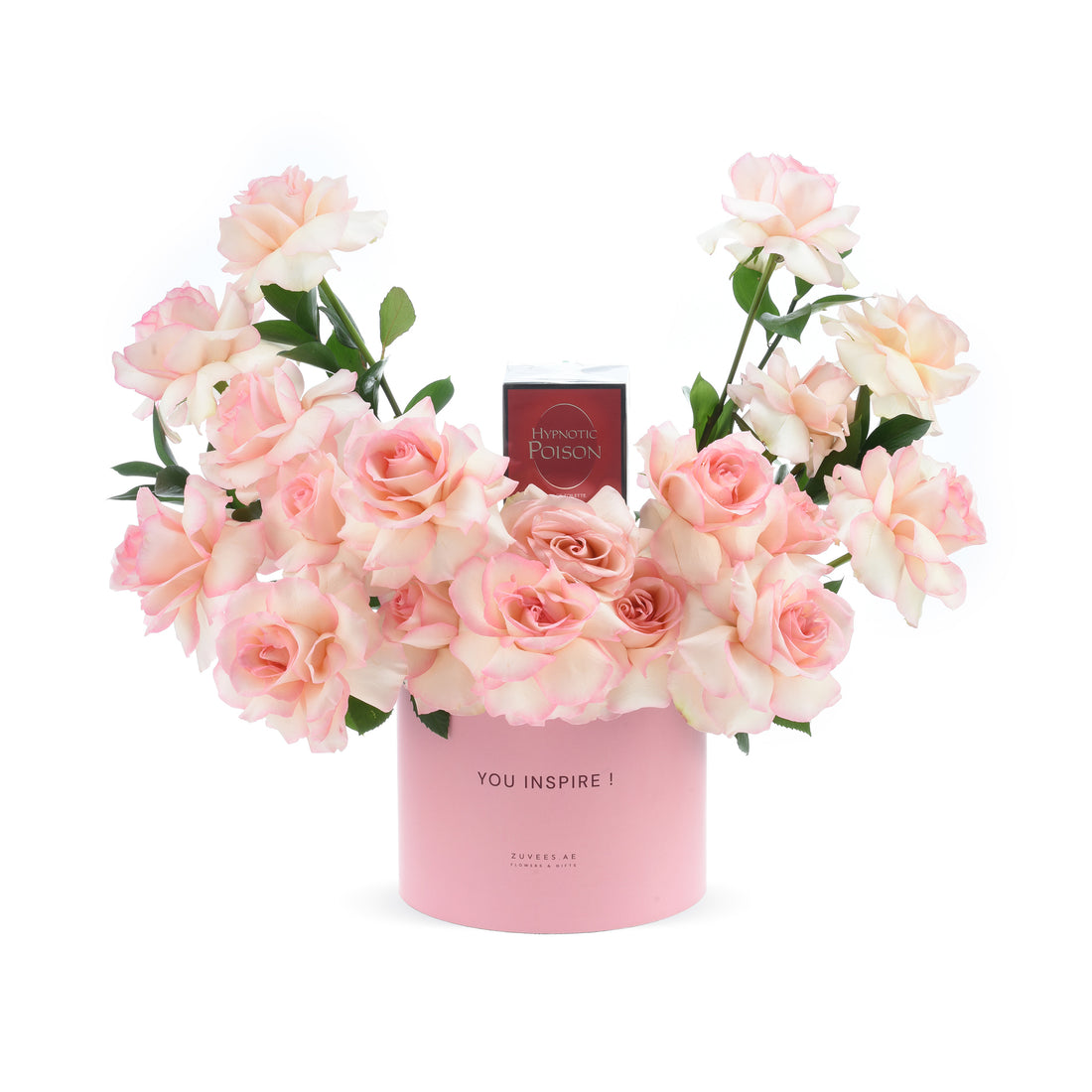 Soft pink roses in round vase with “YOU INSPIRE!” message and perfume gift.