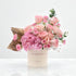 Pink roses and hydrangeas in cream box with "You Complete Me" text.