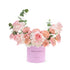 Soft pink roses and eucalyptus in pastel pink cylinder vase with "She&