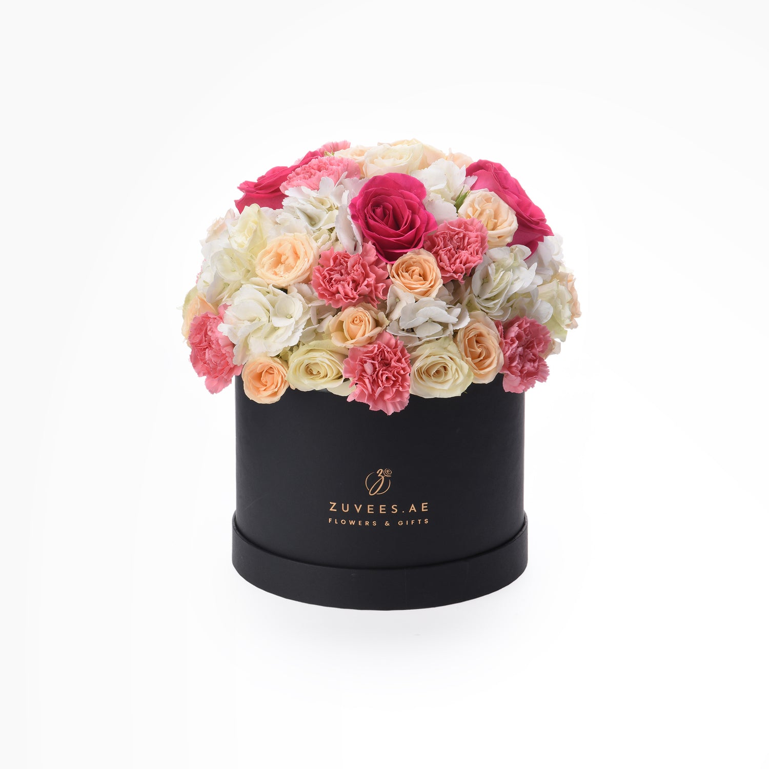 Elegant black hat box overflowing with vibrant pink, peach, and white roses and carnations.