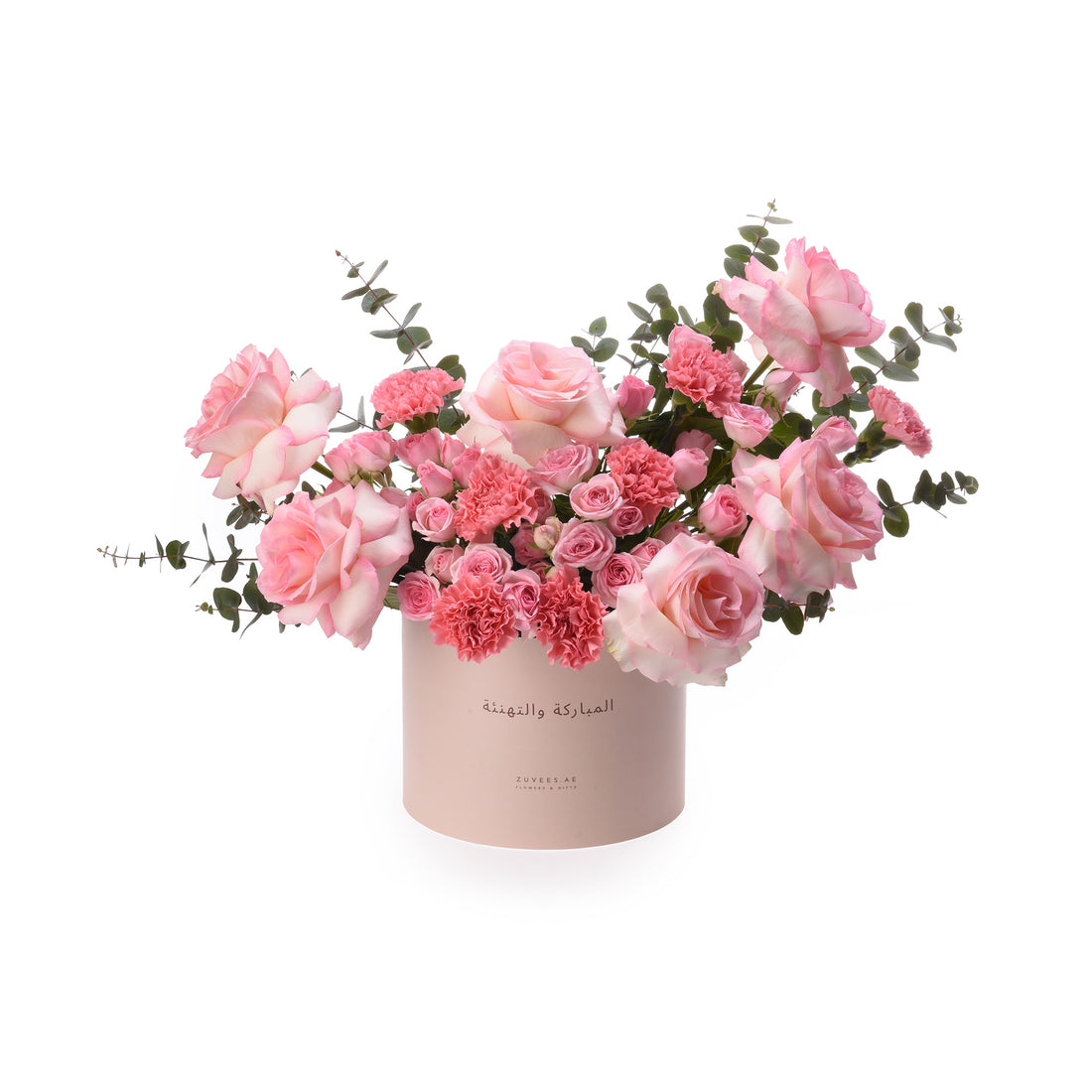 Soft pink roses and carnations in elegant blush box with Arabic greeting.