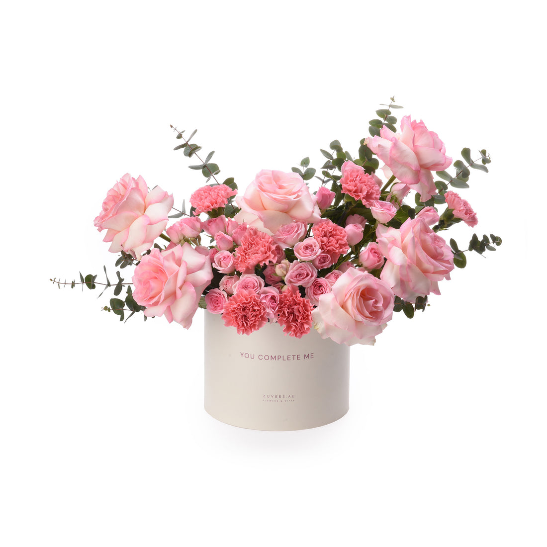 Soft pink roses and carnations in white box with "You Complete Me" text.