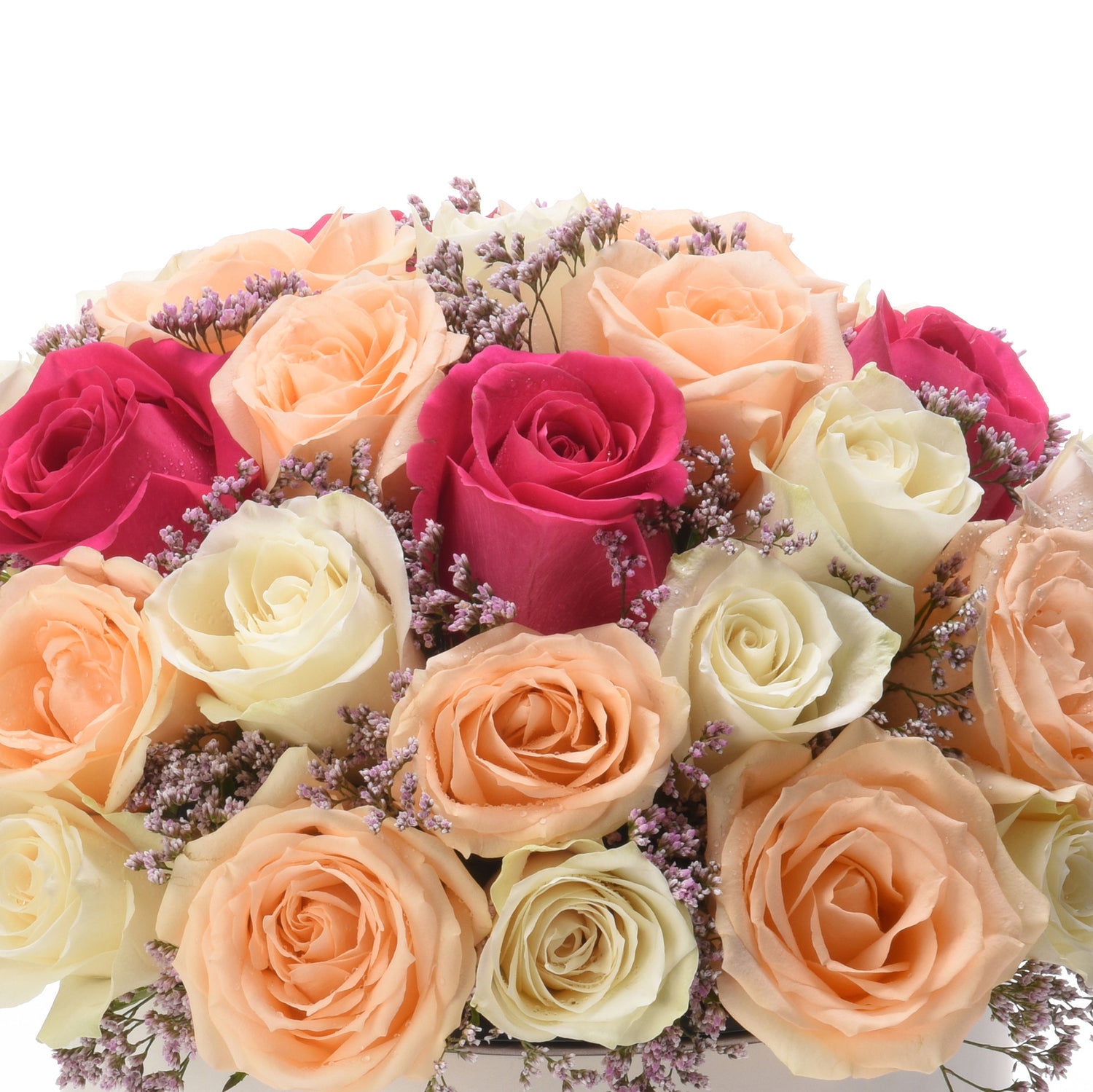 Vibrant bouquet of peach, pink, and cream roses accented with delicate lavender sprigs.