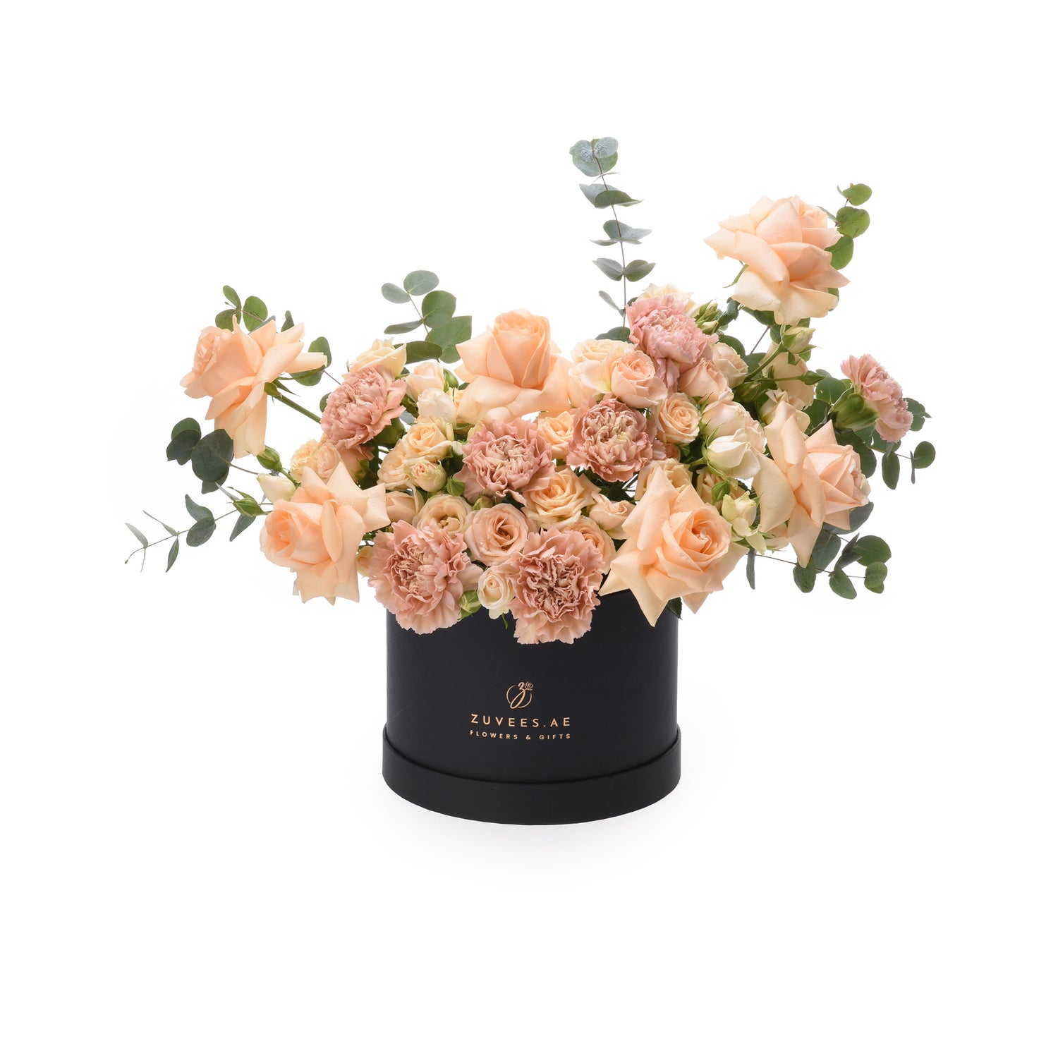 Elegant peach roses and carnations in sleek black box with gold branding.