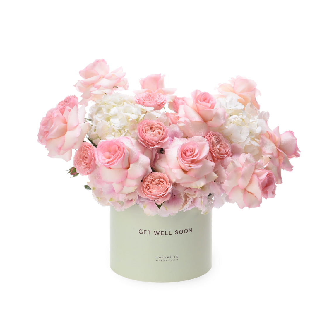 Pastel pink roses and hydrangeas in mint box reading "Get Well Soon".
