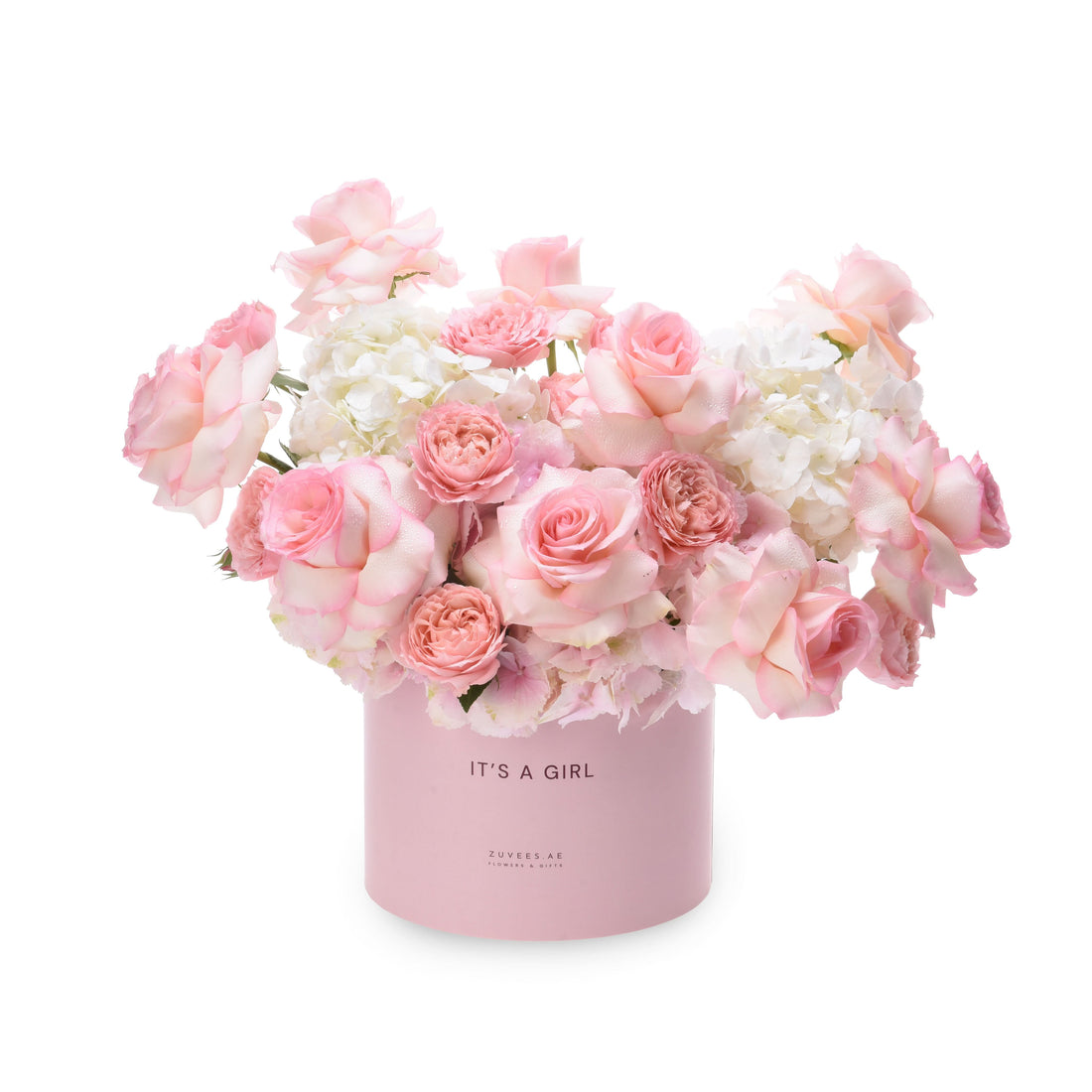Soft pink roses and hydrangeas bloom in a pastel pink box reading "IT&